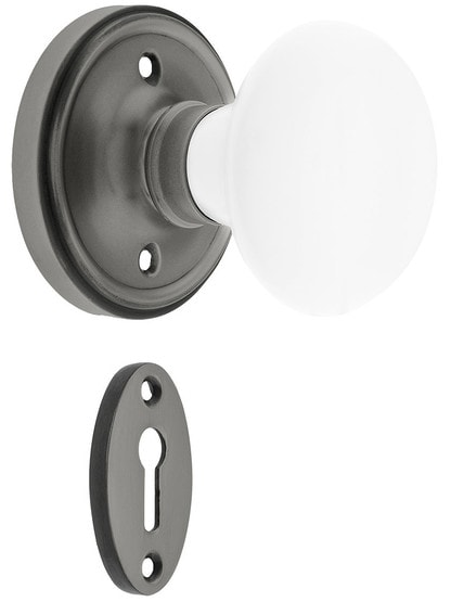 Classic Rosette Mortise Lock Set With White Porcelain Door Knobs in Antique Pewter.